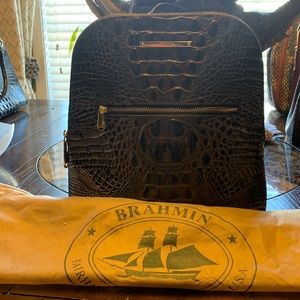 Brahmin’s Backpack. Nice size for traveling and everyday usage. Rarely used